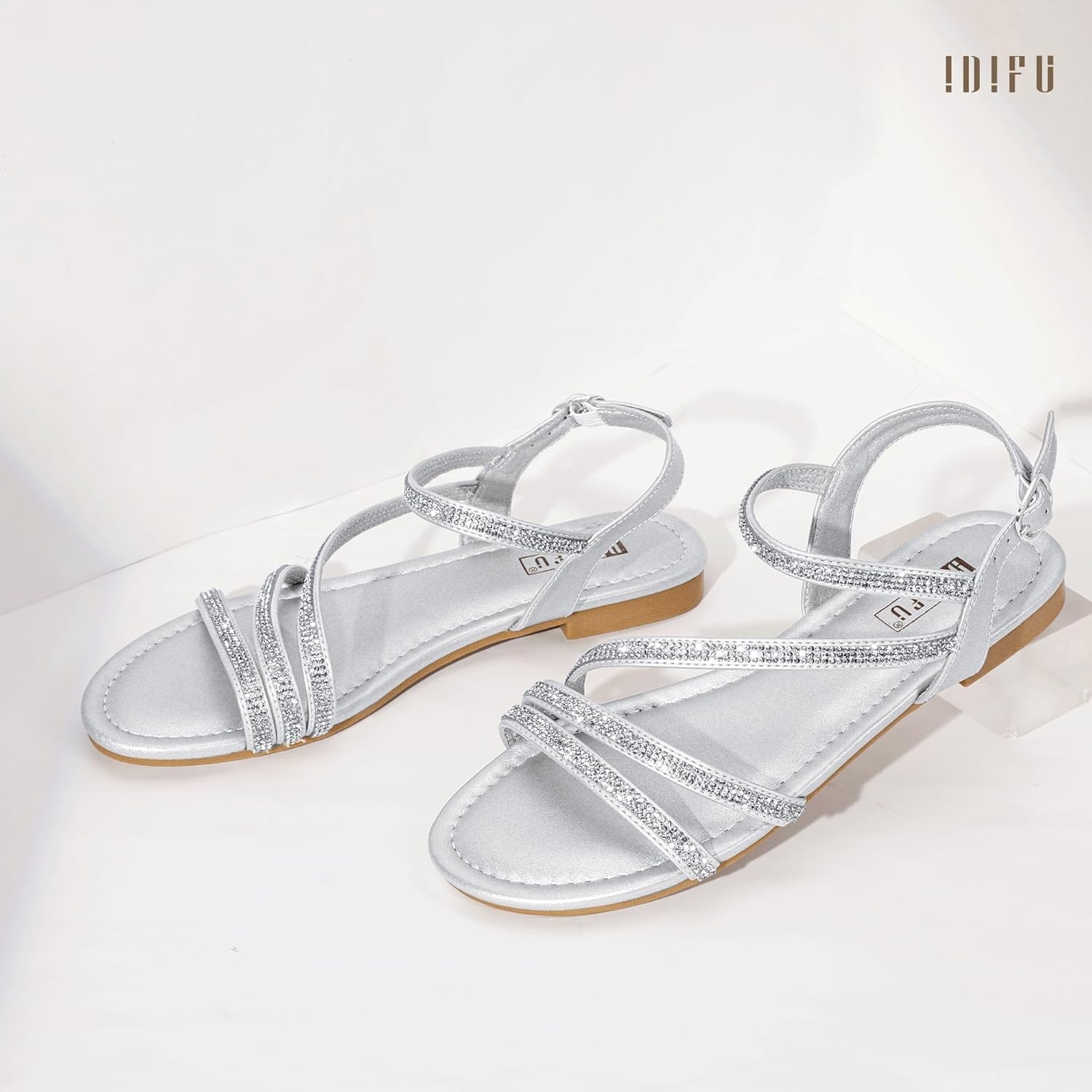 image:imageIDIFU Rhinestone Strappy Sandals for Women Dressy Summer Glitter Flat Sandals with Back Strap Open Toe Slingback Ankle Strap Sandals Wedding Bridal Prom Sparkly Bling Comfortable Cute Dress SandalsSilver Rhinestone